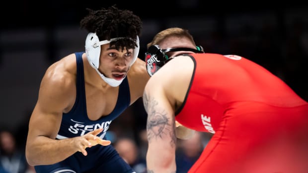 Penn State's Carter Starocci wrestles against Ohio State's Rocco Welsh in a Big Ten Conference match at Rec Hall.
